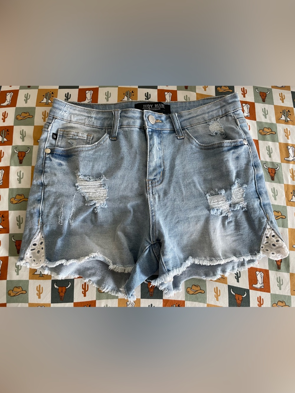 Light Wash Distressed Denim Cutoff Shorts